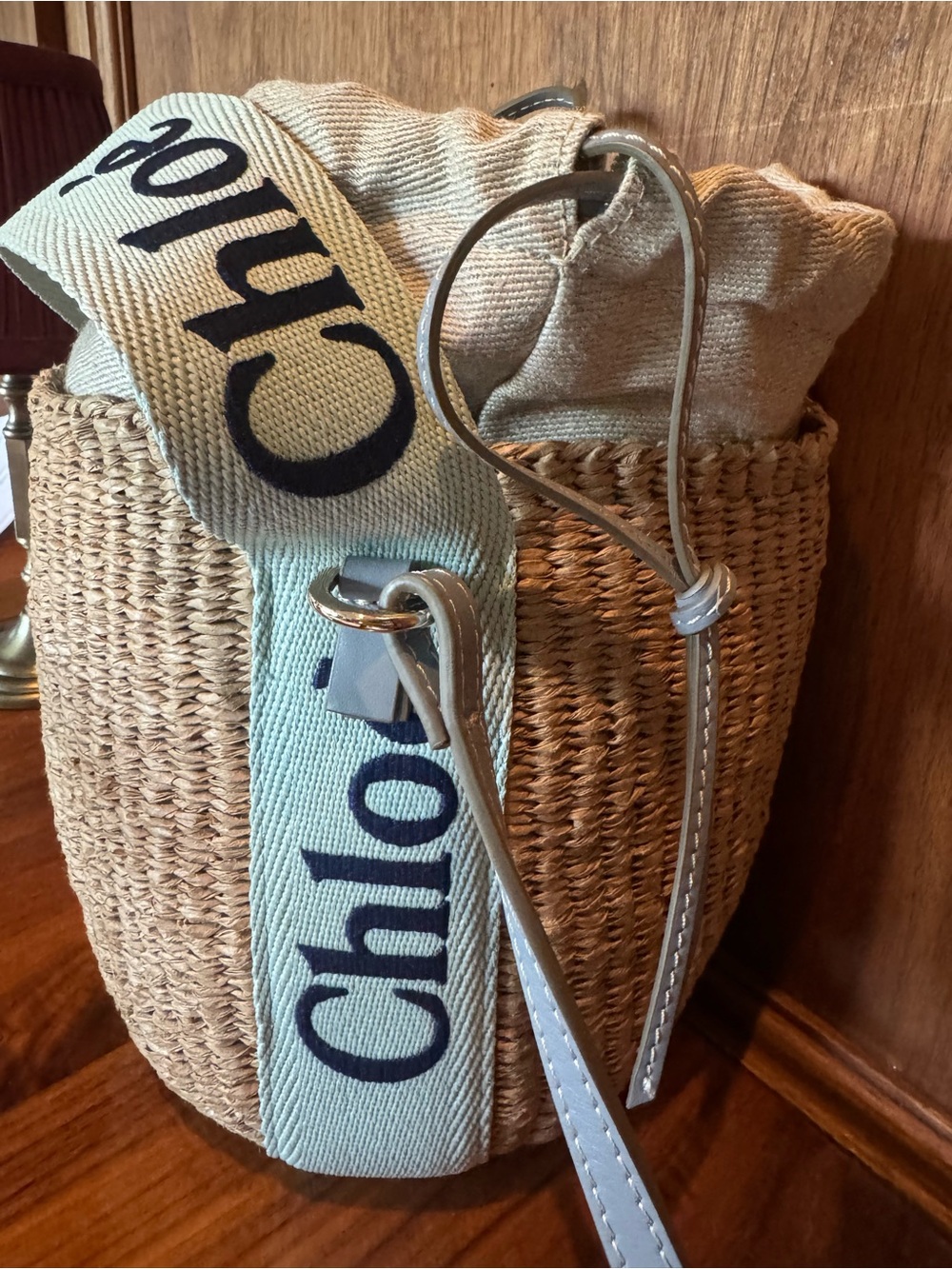 Chloe small Natural Straw Bucket Bag with Light Blue Logo Strap